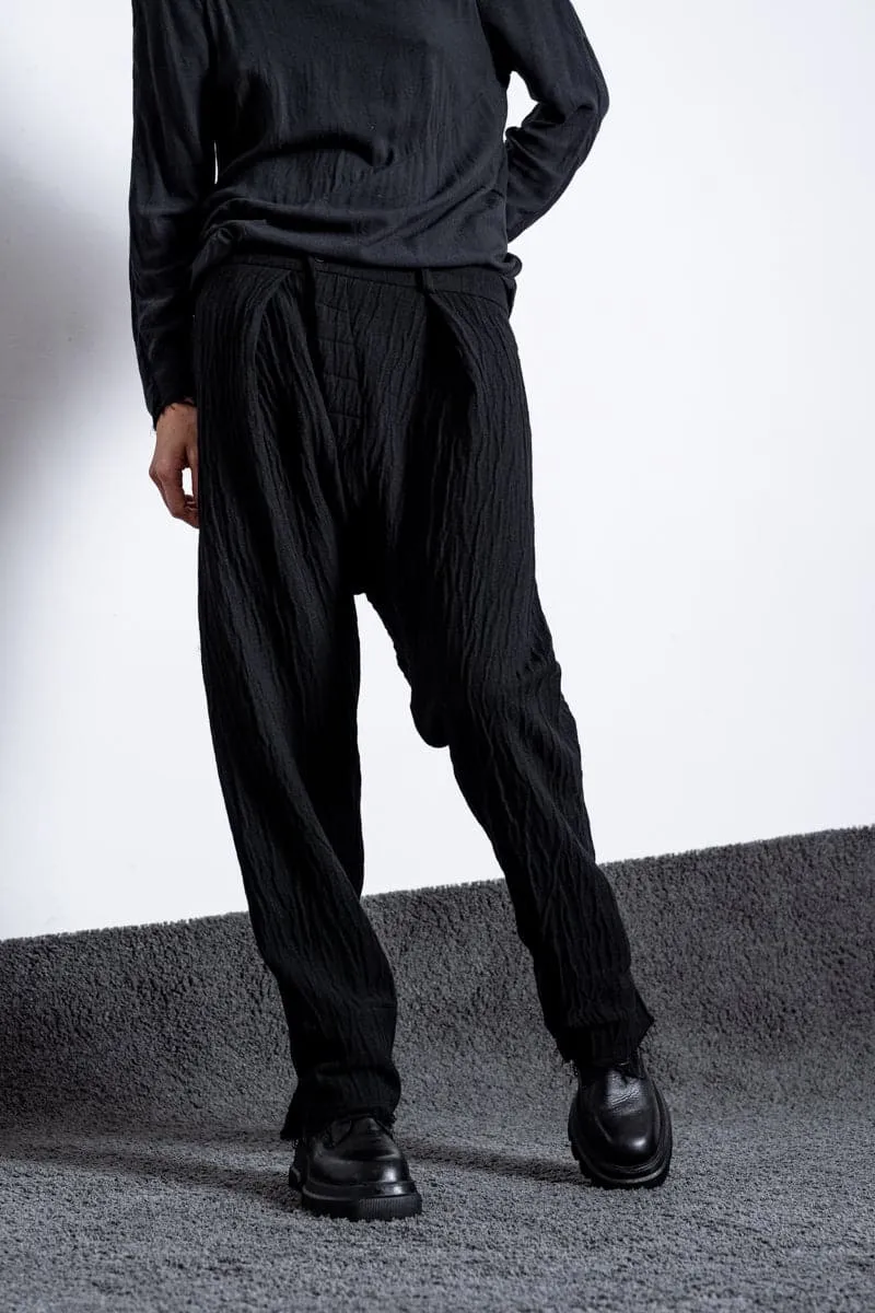 eigensinnig wien | Goethe | Extravagante Baggy Pants mit tiefem Schritt aus Wolle in schwarz