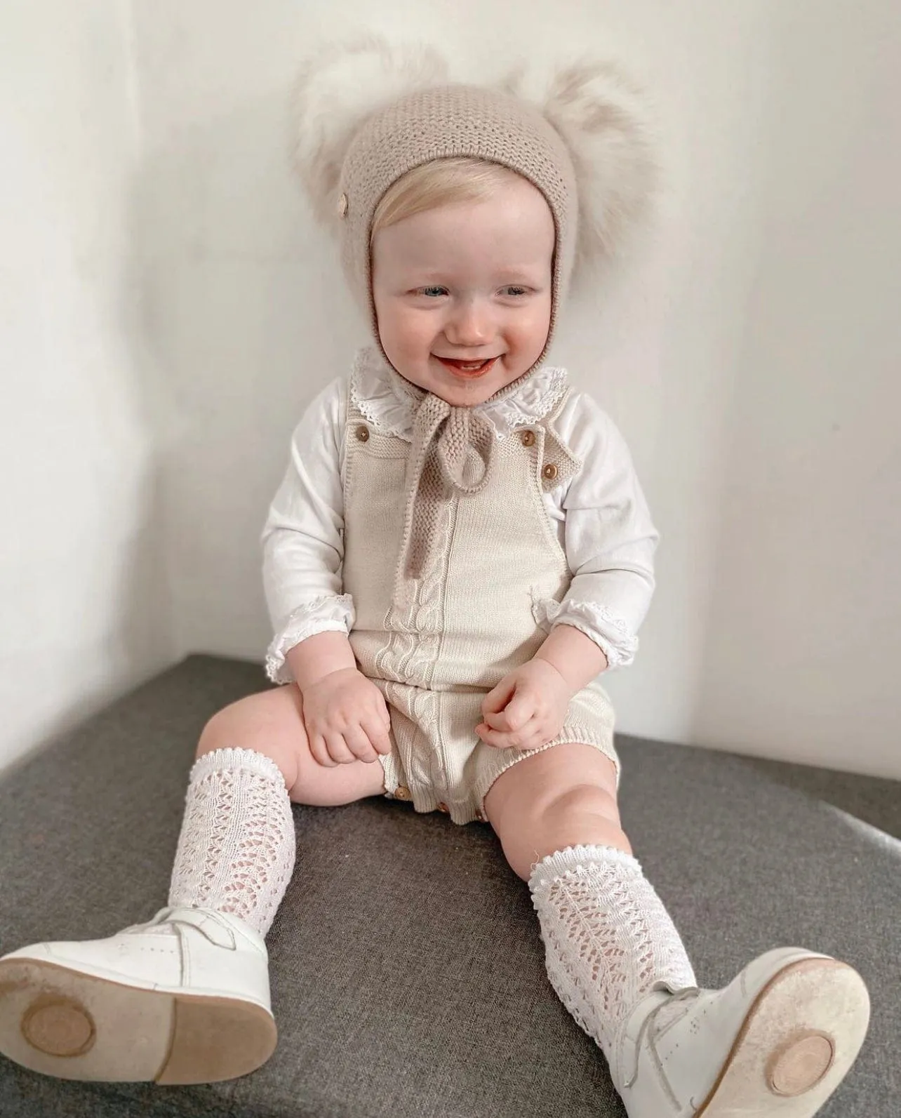 Honeycomb Beige Cashmere Bonnet with White Print Poms